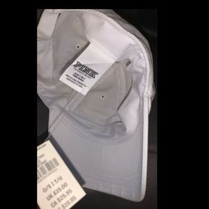 Pink white colored hat